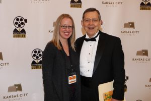 a man and woman in black at the KC Film Fest