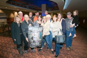 a group of people with the High School Poster