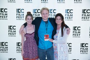 a man with two ladies at the KC Film Fest